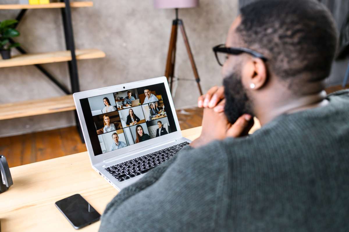 A property management virtual assistant on a video call with the team. 